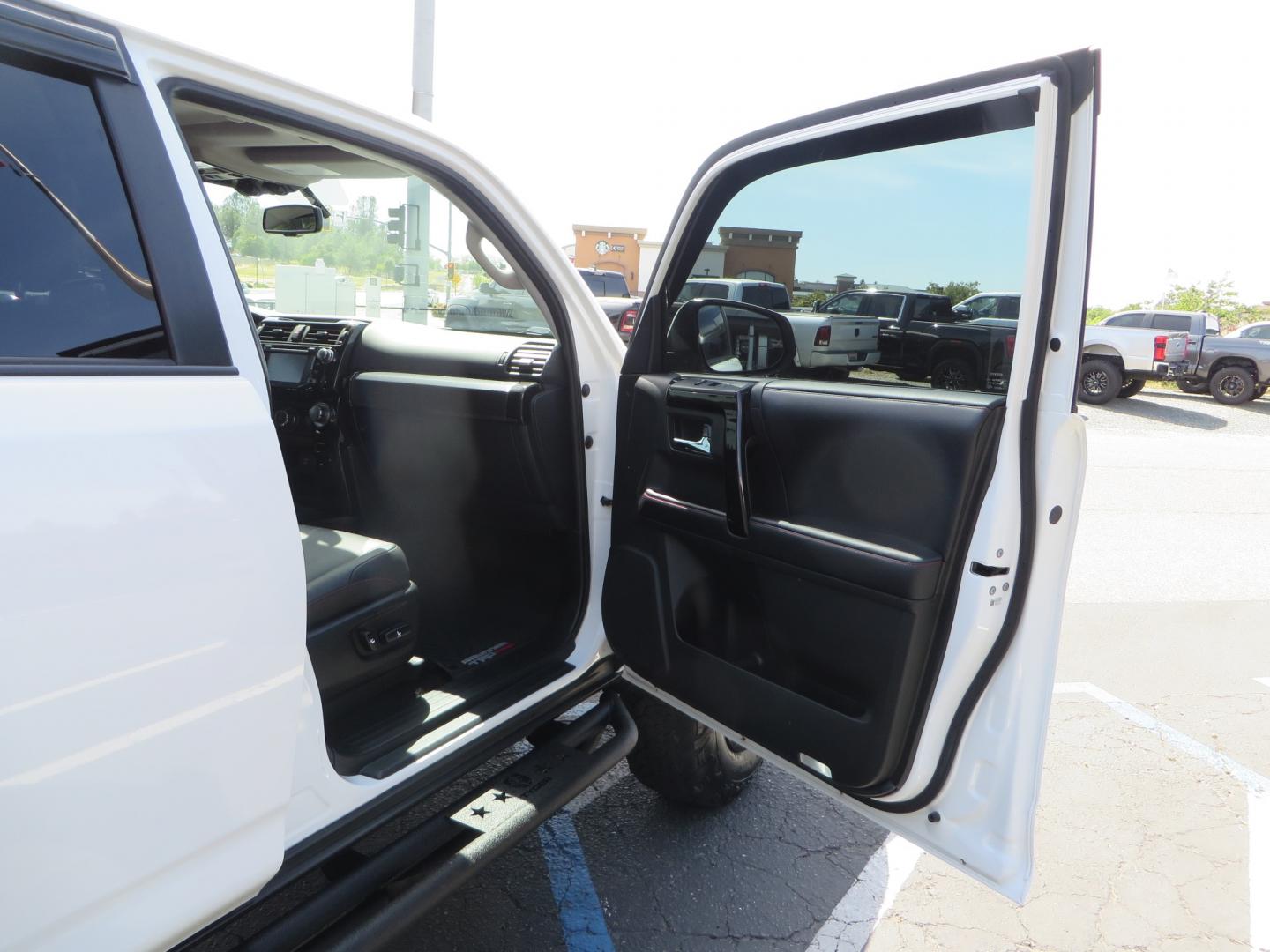 2019 White /black Toyota 4Runner TRD PRO 4WD (JTEBU5JR9K5) with an 4.0L V6 DOHC 24V engine, 5A transmission, located at 2630 Grass Valley Highway, Auburn, CA, 95603, (530) 508-5100, 38.937893, -121.095482 - TRD PRO 4Runner sitting on 17" SCS wheels, BFG KO2 tires, Tyger running boards, Roof Rack with ladder, and window tint. - Photo#39